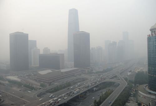 北京雾霾净化塔惹争议 专家称效果不如找布盖工地