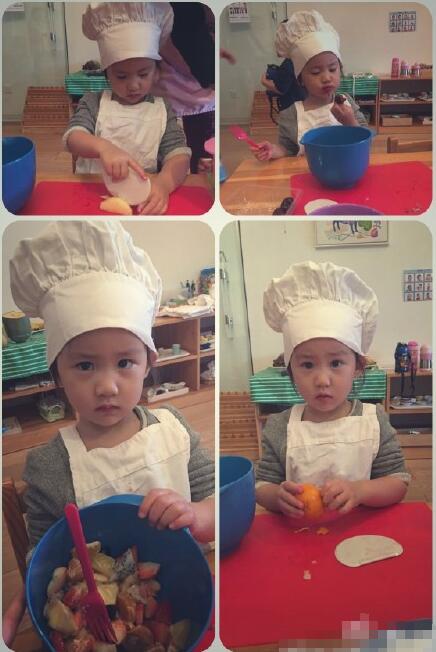 黄磊小女儿戴厨师帽显呆萌 专心切水果不时偷吃一口