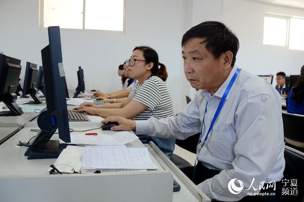 揭秘高考阅卷场:评阅一道题最多要经过四关