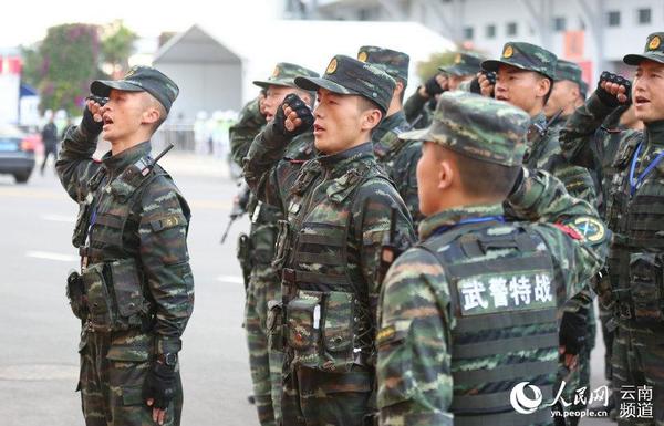 6月14日,武警云南总队昆明市支队参战官兵在第四届南博会执勤现场举行