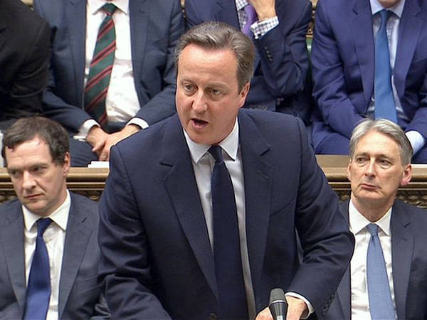英国首相卡梅伦在议会发表讲话。（图片来源：新华/路透）