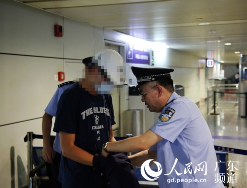 犯罪嫌疑人李某被警方抓获回国。广州警方 供图