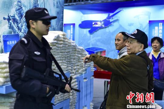 广东警方展示飓风2016行动成果 毒品假钞警用