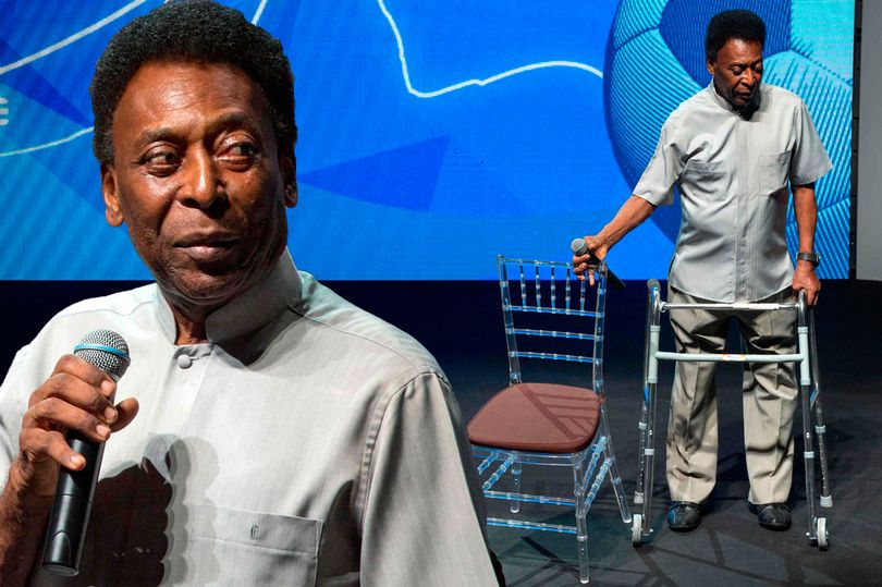 MAIN-Legendary-Brazilian-footballer-Pele-uses-a-walking-frame-to-stand-on-stage.jpg