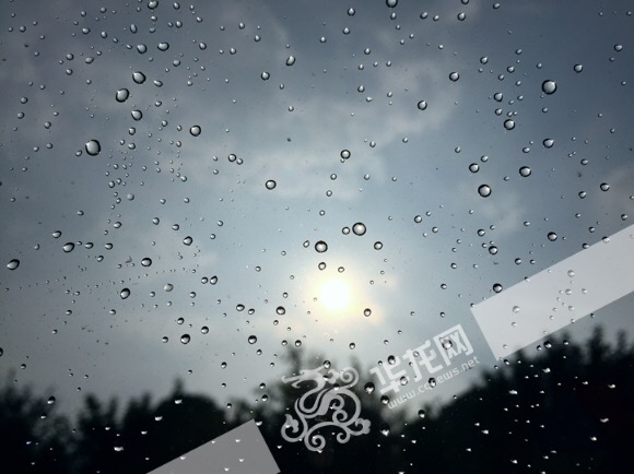 重庆部分地区下起的"太阳雨".记者 李裕锟 摄