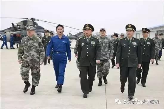 第一次考核时,秦卫江并没有到场,他当时正与陆军司令员李作成调研规模